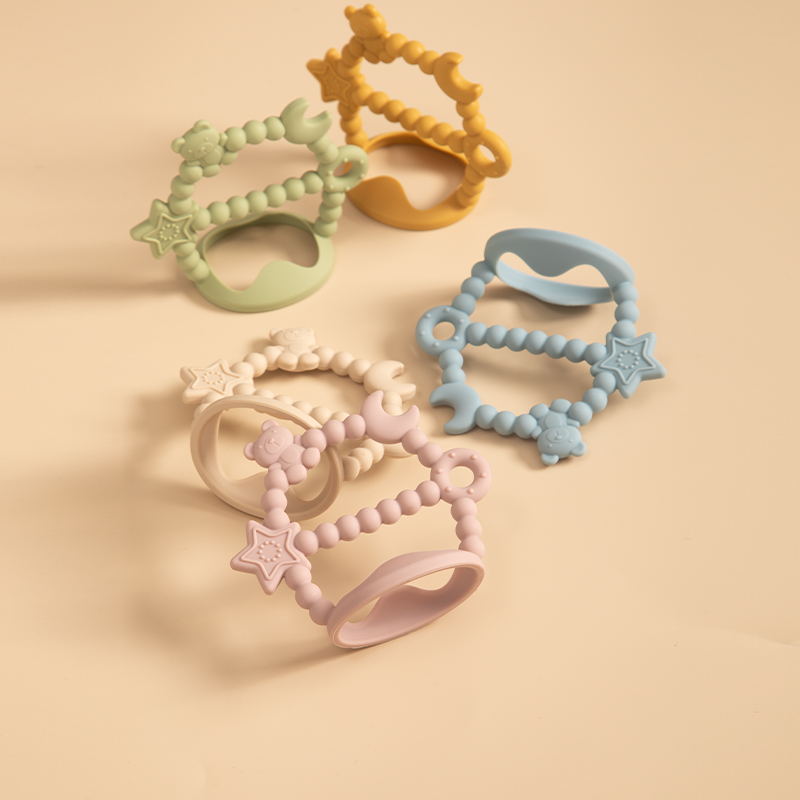 Baby Teething Toy Silicone Tee - огляд і ціна Teething Mitten Baby